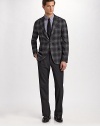 A modern-day must that embodies your unique sartorial style: a bold windowpane design mixes with subtle lavender detail for ultimate work-to-weekend versatility. Three button rolls to a two-button closure Notch lapel Chest ticket pocket Waist flap pockets About 28¾ from shoulder to hem 69% polyester/29% viscose/2% elastane Dry clean Made in Italy 