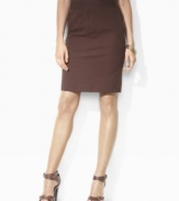 Rendered in sleek stretch twill, Lauren by Ralph Lauren's Sarah skirt is finished in a straight silhouette with a chic extended buttoned tab at the waist.