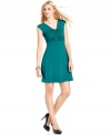 Elegant draping adds a glamorous appeal to this petite jersey dress from Spense -- a perfect choice for dinner and drinks!