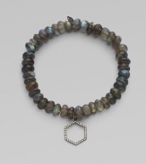 This labradorite beaded, stretch design is accented with a diamond embellished rhodium hexagon charm for a sleek look. Labradorite beadsRhodiumDiamonds, .16 tcwLength, about 6¾Elastic slip-on styleMade in USA of imported materials