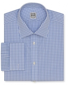 A tried-and-true check pattern lends traditional appeal to this finely tailored dress shirt from Ike Behar, crafted with a regular fit and a comfortable drape. Pair with a silk tie for a strong professional look.