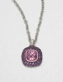 A cushion-cut pink corundum stone surrounded by pavé amethyst stones set in textured sterling silver on a link chain. Pink corundum and amethystSterling silverLength, about 17Pendant size, about 1Lobster clasp closureImported 