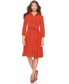 A shirtdress with swing, from NY Collection. The fluid drape and flared silhouette enhances any figure!