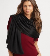 Hand-woven and hand-dyed cashmere/silk wrap reverses from a matte to a shine. Woven satin ball fringe 78L X 22W Imported