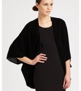 An ultra-plush, velvet-y soft shrug with chic stripes.70% viscose/23% silk/7% polyesterAbout 80 X 115Dry cleanImported