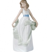 Celebrate eternal youth and beauty with this elegant handmade porcelain figurine from Lladró. An ideal gift that sparks care-free joy within any special someone.