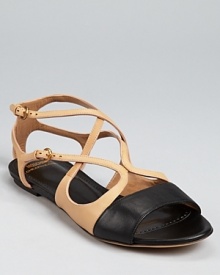 In a two-tone design, these classically colored Moschino Cheap and Chic sandals make a strappy statement for summer.