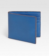 Classic bill holder of treated mill leather and contrasting trim for a contemporary touch.One billfold compartmentSix card slotsLeather4W x 4HImported