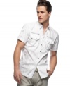 Shorten your list of must-haves this season with this comfortable woven shirt from INC International Concepts.