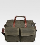 A versatile, dependable duffel is designed in a wax-impregnated canvas that combines the durability of nylon and the ease of cotton for greater strength and abrasion resistance. Zip closureRemovable shoulder strapExterior, interior pocketsCustom die-cast hardware18W X 10H X 9½DImported