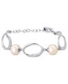 Understated elegance. This bracelet from Majorica is crafted from sterling silver with organic man-made pearls (10/12 mm) added for classic appeal. Approximate length: 7-1/2 inches.