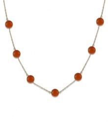 A few carnelian gems (10 mm) collect across a 14k gold chain to create the perfect necklace to add a little pop of color to your wardrobe. Approximate length: 16 inches.