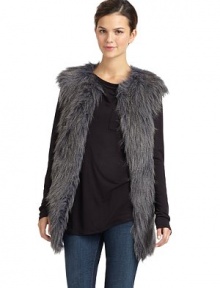 THE LOOKVariegated faux fur design Round necklineFront fur hook closuresSleevelessSeam pocketsTHE FITAbout 29 from shoulder to hemTHE MATERIALPolyester/acrylicCARE & ORIGINDry cleanImportedModel shown is 5'10 (177cm) wearing US size Small. 