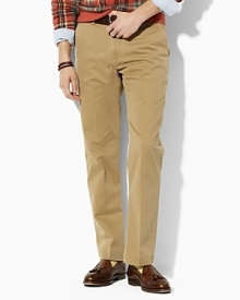 A classic-fitting, sophisticated pant is tailored with a relaxed straight leg, flat front and classic rise in sleek stonewashed cotton chino for refined texture.