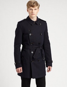 A signature double-breasted trench is structured in a sleek, rain-resistant cotton-wool blend with military-inspired epaulettes, belt-and-button detail behind the collar and a removable warmer for added warmth and versatility.Button-frontShoulder epaulettesHip slash pocketsBelted waistRear ventAbout 35 from shoulder to hem54% cotton/23% virgin wool/23% acrylicDry cleanImportedThis style runs true to size. 