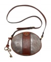 Fossil rethinks the crossbody bag this season with a creative circle silhouette and distressed metallic treatment.