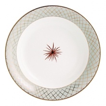 From Bernardaud, jewel-like shapes inspired by the 1940's and an exuberant design imbue this dinnerware pattern with a baroque and precious quality. Etoiles's bold styling offers a new interior aesthetic full of whimsy.