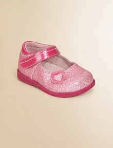 Classic Mary Janes get a sparkly update with pink glitter and an adjustable grip-tape ankle strap.Grip-tape ankle strapSparkly polyurethane upperLeather liningRubber soleImported