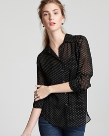 Bedecked in charming polka dots, this Velvet by Graham & Spencer button-up top lends polish to every look.