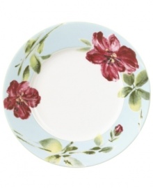 Painterly lilies bloom around this porcelain salad plate, creating a beautiful arrangement with the rest of Oleg Cassini's Sweet Blossom dinnerware.