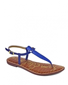 Slender, strappy thong sandals pack a colorful punch; by Sam Edelman.