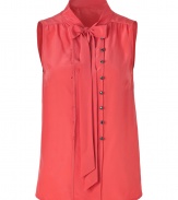 Detailed with a button and looped front panel (which lets you decide how tailored you want to wear it), Marc by Marc Jacobs sleeveless silk top is a unique feminine staple with endless wearing possibilities - Stand-up collar with tie, V-neckline, sleeveless, gathered yolk, front panel with button and loop detail, pull-over style - Loosely fitted - Wear with a boyfriend blazer, dark-wash skinnies and heels