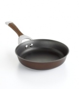 An elegant windsor silhouette in a deep, rich chocolate tone turns things up in the kitchen, making every meal a mixture of sophistication and ease. Constructed for superior performance with a hard-anodized construction, impact-bonded stainless steel base and dishwasher-safe finish. Lifetime warranty.