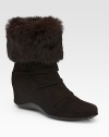 EXCLUSIVELY AT SAKS. Banded weatherproof suede with inside rubber wedge and luxe rabbit fur cuff. Covered inside wedge, 2 (50mm) Shaft, 8 Leg circumference, 13 Rabbit-fur cuff Weatherproof suede upper Breathable microfiber lining Rubber sole Padded insole Imported