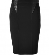 Luxurious skirt made ​.​.from a fine, black synthetic stretch blend - A classic with the famous slenderizing pencil cut - Stylish leather inserts on both sides - The skirt is cut slim and figure-hugging, the hem ends at the knee -  An ultra exclusive no-nonsense basic is so versatile to combine - Perfect for the office with a blazer and blouse or for evening with a silk top and biker jacket