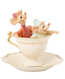 Cinderella's little helpers, Jaq and Gus, go for a ride in a gold-patterned teacup fit for a princess and made for Disney fans in beautiful Lenox porcelain.