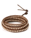 Take your wrist in a bohemian direction with Chan Luu's textured wrap bracelet. Embellished with light-reflecting pearls, this leather piece is perfect for layering.