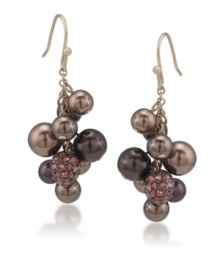 An elegant effect. Carolee's cluster earrings feature beautiful brown-hued glass beads complemented by glittering charms. Crafted in gold tone mixed metal. Approximate drop: 2-7/8 inches.