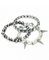 Chic and complementary. Three different kinds of stretch bracelets--including metallic beaded and sparkling glass accent and crystal versions, as well an imitation pearl and spike style--have an eclectic effect on this set from GUESS. The stretch design ensures a comfortable, flexible fit. Approximate diameter: 2-1/4 inches.