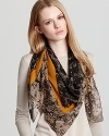 Channel across-the-pond style in this Burberry square scarf, featuring a black and beige fall floral print.