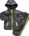 He'll look like the cutest little track star in this cozy fleece hooded jacket and pants set by Puma.