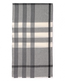 In tonal grey hues, this Burberry scarf is crafted in luxe, ultra-soft brushed wool.