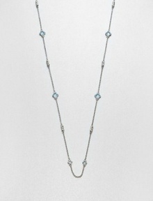 From the Estate Collection. Beautifully faceted blue topaz stone set in intricately designed, sterling silver on a delicate link chain. Blue topazSterling silverLength, about 34Lobster clasp closureImported