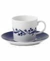 Ringed with navy flora, the Fable Garland teacup boasts distinct Scandinavian style and, in Royal Doulton porcelain, is up for just about any task. Saucer features band of navy. Mix with other Karolin Schnoor nature patterns to customize your table.