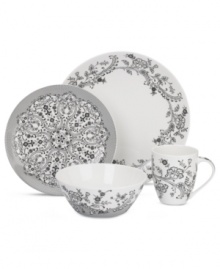 Oleg Cassini weaves a table of playful sophistication with the lacy flowers and dots of Ava dinnerware. Layer the varied black and white pieces for a casual setting that's altogether – and effortlessly – stylish.