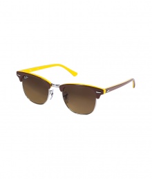 A counter-culture favorite as stylish today as ever, Ray-Bans Clubmaster sunglasses lend a timeless retro feel to every outfit - Brown acetate half-frames and handles with yellow reverse, silver-toned metal half-frames and bridge, clear nose-pieces, brown semi-mirrored lenses - Lens filter category 3 - Comes with a logo-stamped semi-hard carrying case - An iconic choice destined to become your four season favorites