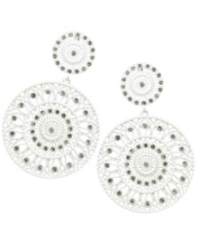 A fresh start. These bright white earrings by GUESS are perfect to build your look from. A chic doorknocker design glistens in round-cut crystal. Set in white-plated mixed metal with a post backing. Approximate drop: 3-1/4 inches.