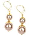 Double the fun. AK Anne Klein's classy double drop earrings feature rosy faux-pearls and golden details. Crafted in gold tone mixed metal, they're suitably stylish for daytime or evening. Approximate drop: 1-1/2 inch.