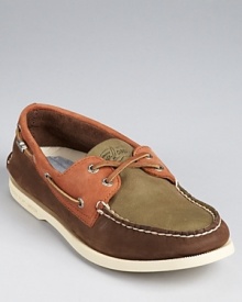 Classic boat shoes from the original, crafted in an easy-to-wear slip-on style with traditional lace and stitching detail and updated with color-block panels for modern appeal.