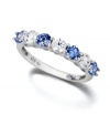 True blue. Remarkable sparkle adorns Arabella's seven-stone ring. Features round-cut blue and white Swarovski zirconias (2-1/6 ct. t.w.) set in sterling silver. Size 7.