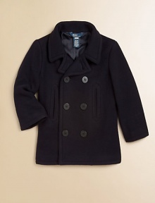 The essential peacoat in luxuriously soft wool is classically rendered for a timeless appeal.Notch collarLong sleevesDouble-breasted button-frontFront slash pocketsSingle back ventWoolDry cleanImported Please note: Number of buttons may vary depending on size ordered. 