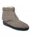 Authentic details--such as hand stitching, metal hardware and braided leather trim--make Minnetonka Moccasin's fringe ankle boots a tried-and-true favorite. Pile lining adds warmth, while the lightweight flex sole makes them comfortable and easy to wear.