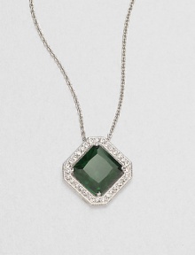 A rich emerald-colored faceted square of cubic zirconia is framed by shimmering pavé crystals in this lovely design on a silvery chain.Crystal and cubic zirconiaRhodium platingChain length, about 16Pendant, about ½ squareLobster claspImported