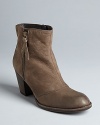 Take a subtle approach to your Western booties with this Paul Green design, set on stacked heels with topstiched soles.