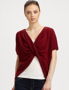 This v-neck, twist-front cashmere topper is perfect for snuggling luxuriously.CashmereShort sleevesPullover styleHand wash or dry cleanImported