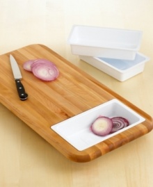 Cut and collect. This clever cutting board offers plenty of prep space and three removable plastic trays to hold your sliced and diced ingredients. One-year warranty.